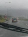 On the way there in the pouring rain. This is Rosie and Kelvin's car in front of us.